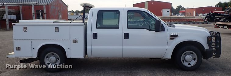 image for item DE1093 2008 Ford F250 Super Duty Crew Cab utility bed pickup truck