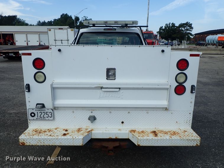 image for item DE1093 2008 Ford F250 Super Duty Crew Cab utility bed pickup truck