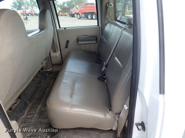 image for item DE1093 2008 Ford F250 Super Duty Crew Cab utility bed pickup truck