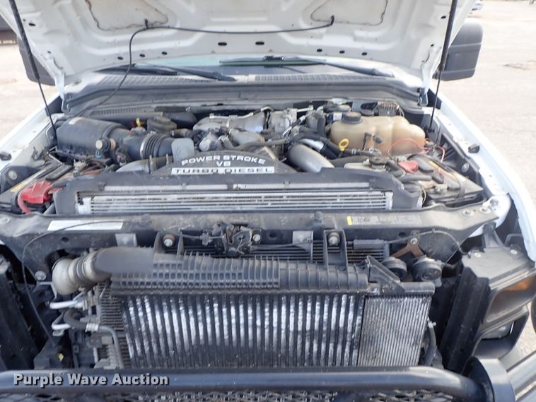 image for item DE1093 2008 Ford F250 Super Duty Crew Cab utility bed pickup truck