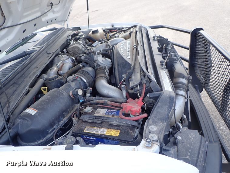 image for item DE1093 2008 Ford F250 Super Duty Crew Cab utility bed pickup truck