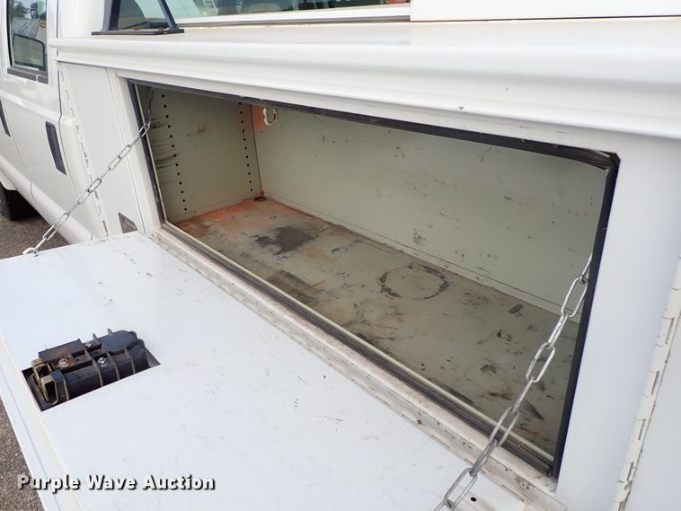 image for item DE1093 2008 Ford F250 Super Duty Crew Cab utility bed pickup truck