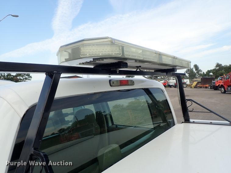 image for item DE1093 2008 Ford F250 Super Duty Crew Cab utility bed pickup truck