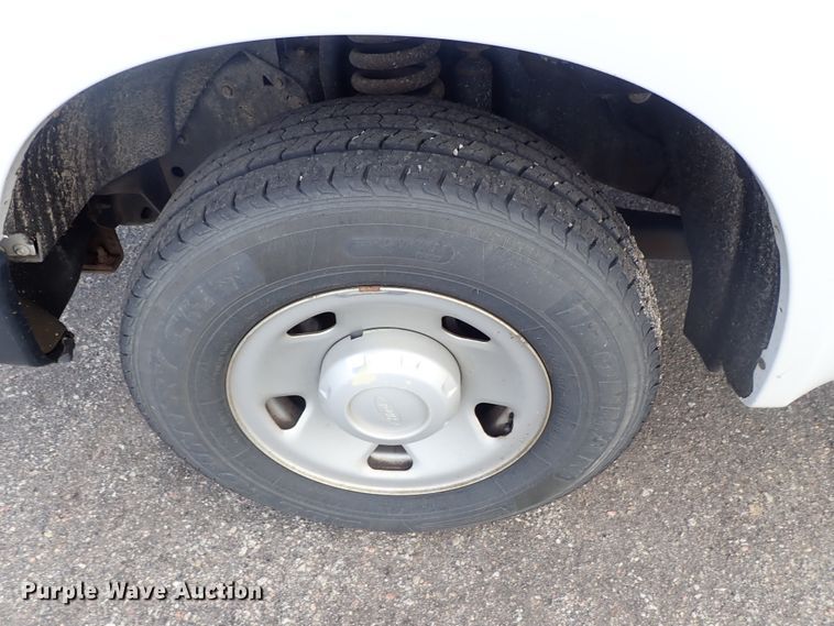 image for item DE1093 2008 Ford F250 Super Duty Crew Cab utility bed pickup truck