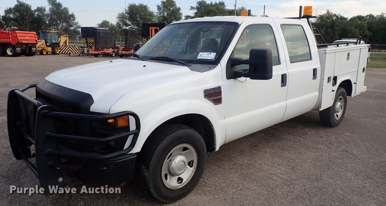 image for item DE1094 2008 Ford F250 Super Duty Crew Cab utility bed pickup truck