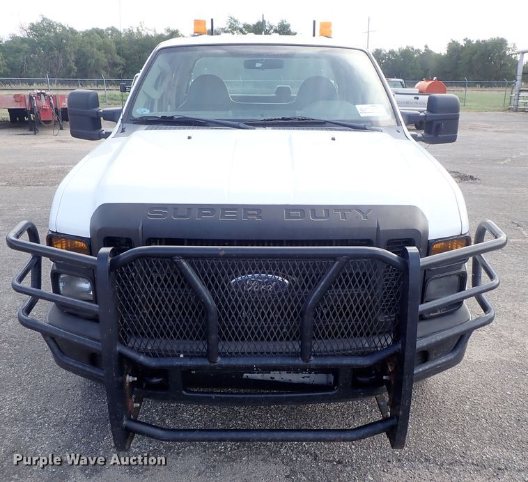 image for item DE1094 2008 Ford F250 Super Duty Crew Cab utility bed pickup truck