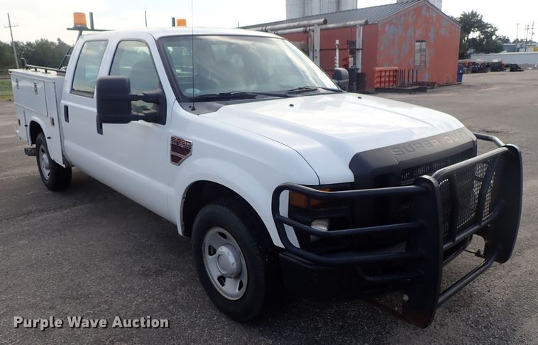 image for item DE1094 2008 Ford F250 Super Duty Crew Cab utility bed pickup truck