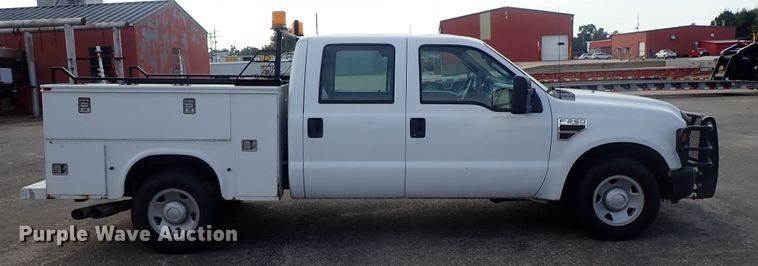 image for item DE1094 2008 Ford F250 Super Duty Crew Cab utility bed pickup truck