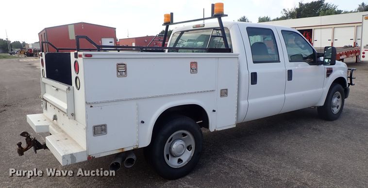 image for item DE1094 2008 Ford F250 Super Duty Crew Cab utility bed pickup truck