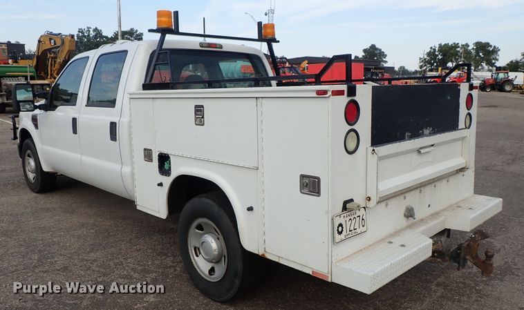image for item DE1094 2008 Ford F250 Super Duty Crew Cab utility bed pickup truck