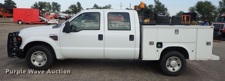 image for item DE1094 2008 Ford F250 Super Duty Crew Cab utility bed pickup truck