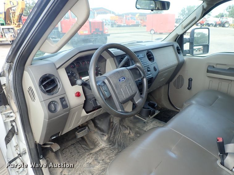 image for item DE1094 2008 Ford F250 Super Duty Crew Cab utility bed pickup truck