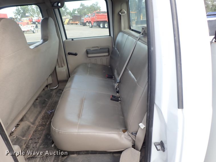 image for item DE1094 2008 Ford F250 Super Duty Crew Cab utility bed pickup truck