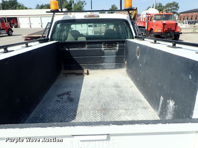 image for item DE1094 2008 Ford F250 Super Duty Crew Cab utility bed pickup truck