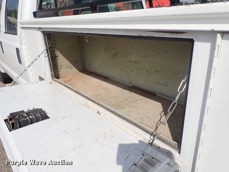 image for item DE1094 2008 Ford F250 Super Duty Crew Cab utility bed pickup truck