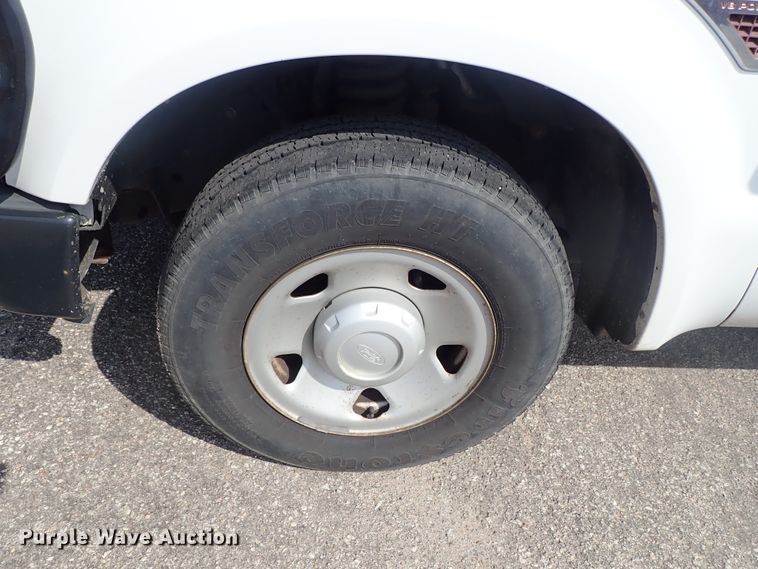 image for item DE1094 2008 Ford F250 Super Duty Crew Cab utility bed pickup truck