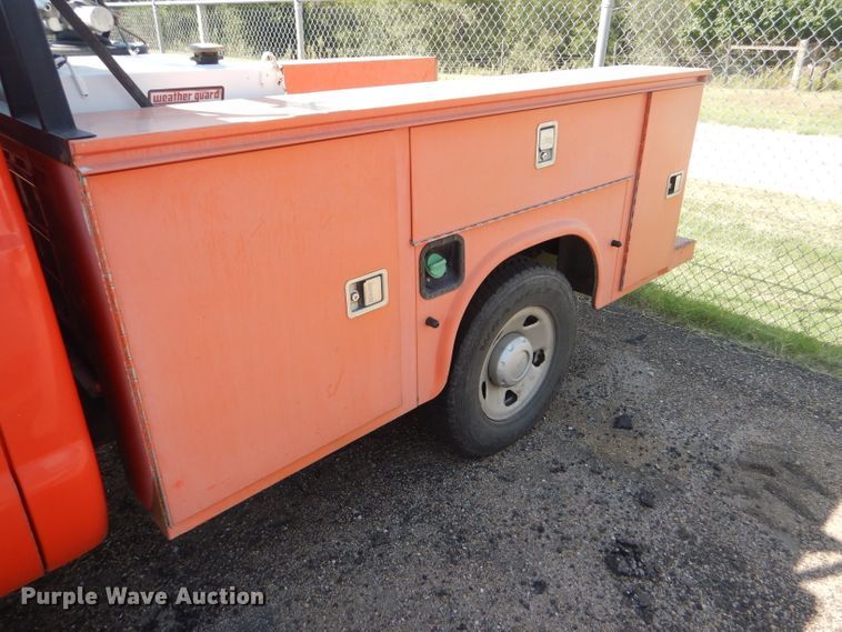 image for item DE4336 2009 Ford F250 Super Duty utility bed pickup truck