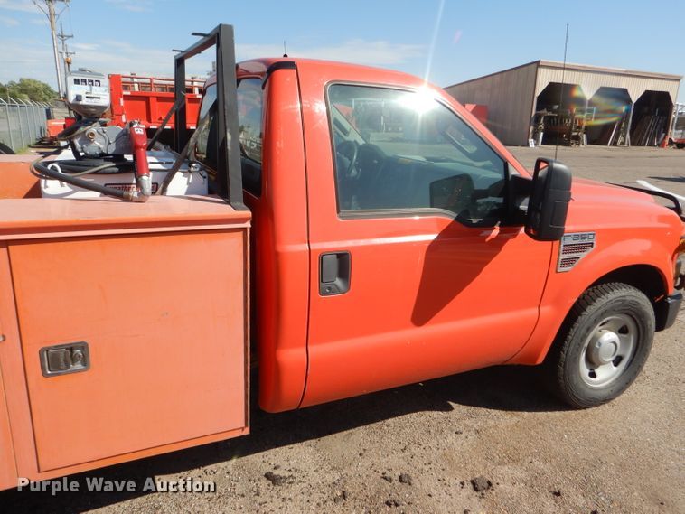 image for item DE4336 2009 Ford F250 Super Duty utility bed pickup truck