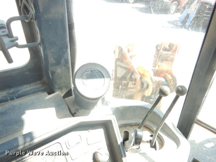 image for item FC9946 2003 John Deere 310G backhoe