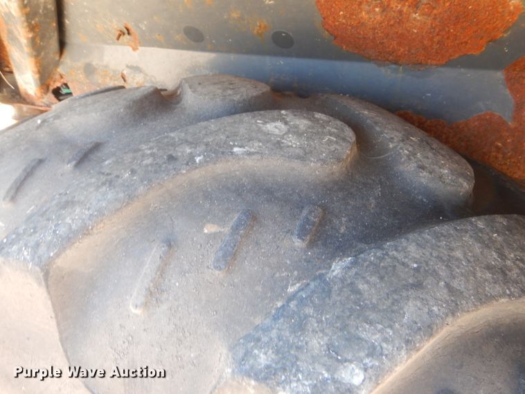 image for item FC9946 2003 John Deere 310G backhoe