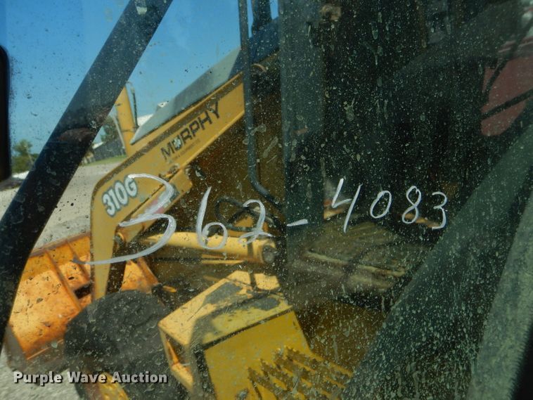 image for item FC9946 2003 John Deere 310G backhoe