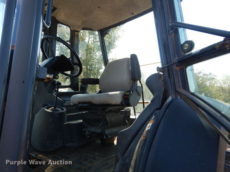 image for item FC9947 2003 John Deere 310G backhoe