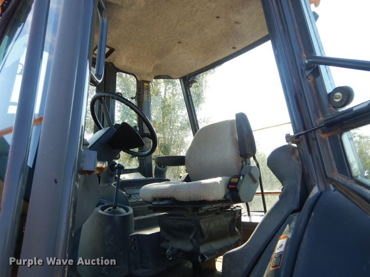 image for item FC9947 2003 John Deere 310G backhoe