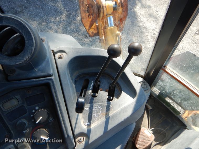 image for item FC9947 2003 John Deere 310G backhoe