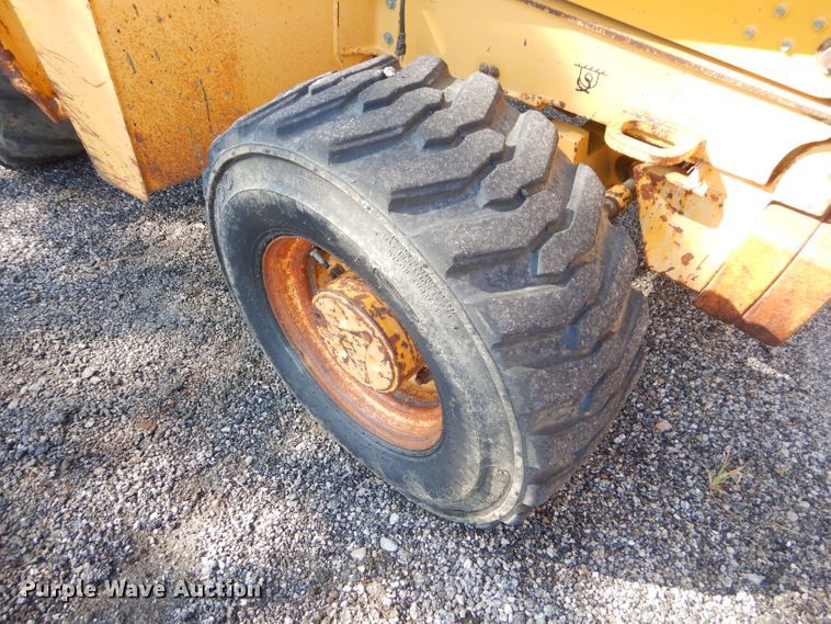 image for item FC9947 2003 John Deere 310G backhoe