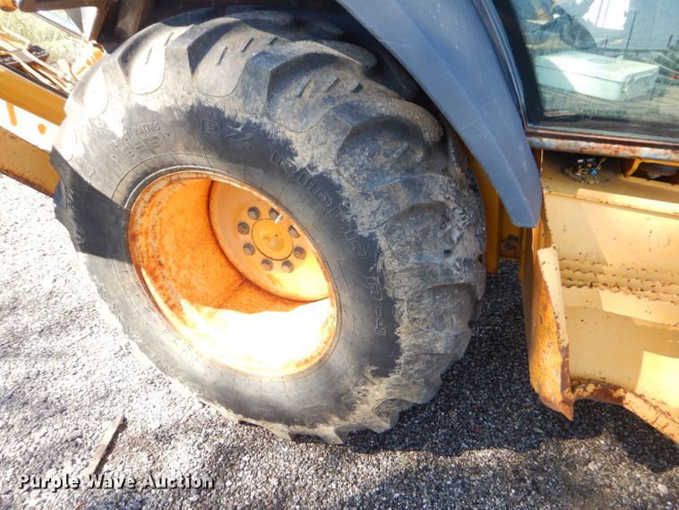 image for item FC9947 2003 John Deere 310G backhoe