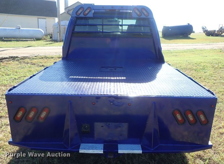 image for item DB7700 2003 Ford F250 Super Duty Crew Cab flatbed pickup truck