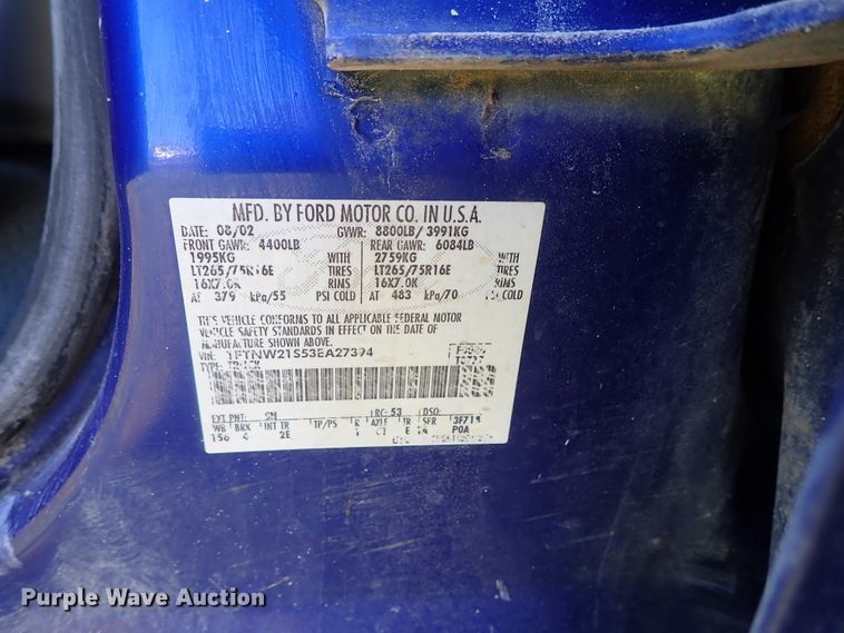 image for item DB7700 2003 Ford F250 Super Duty Crew Cab flatbed pickup truck