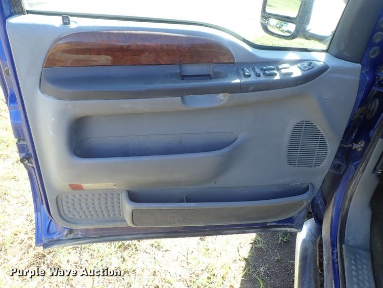 image for item DB7700 2003 Ford F250 Super Duty Crew Cab flatbed pickup truck