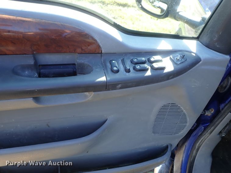 image for item DB7700 2003 Ford F250 Super Duty Crew Cab flatbed pickup truck