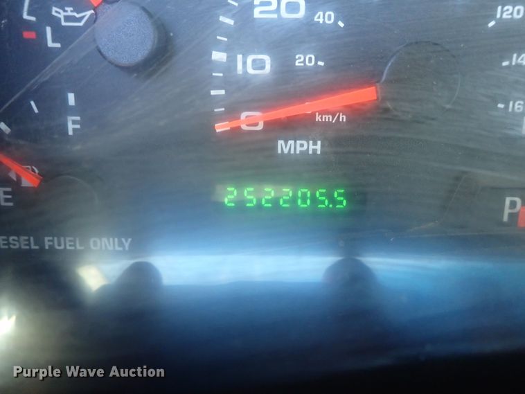 image for item DB7700 2003 Ford F250 Super Duty Crew Cab flatbed pickup truck