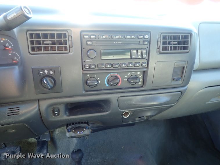 image for item DB7700 2003 Ford F250 Super Duty Crew Cab flatbed pickup truck