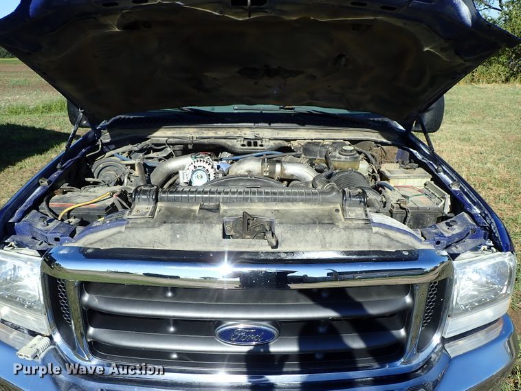 image for item DB7700 2003 Ford F250 Super Duty Crew Cab flatbed pickup truck