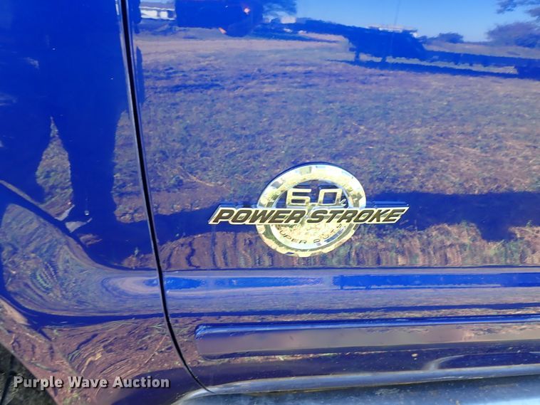 image for item DB7700 2003 Ford F250 Super Duty Crew Cab flatbed pickup truck