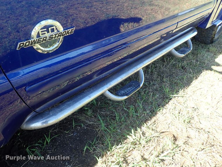 image for item DB7700 2003 Ford F250 Super Duty Crew Cab flatbed pickup truck