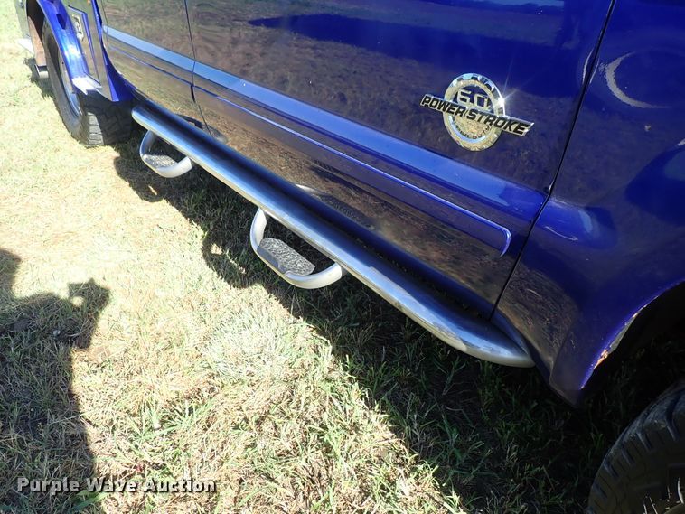 image for item DB7700 2003 Ford F250 Super Duty Crew Cab flatbed pickup truck