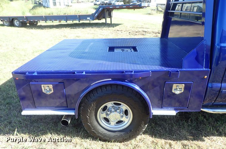 image for item DB7700 2003 Ford F250 Super Duty Crew Cab flatbed pickup truck