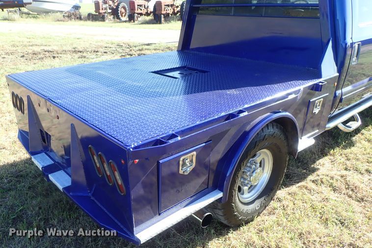 image for item DB7700 2003 Ford F250 Super Duty Crew Cab flatbed pickup truck