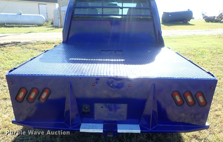 image for item DB7700 2003 Ford F250 Super Duty Crew Cab flatbed pickup truck