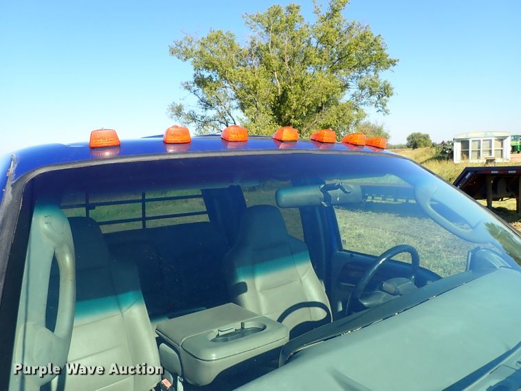 image for item DB7700 2003 Ford F250 Super Duty Crew Cab flatbed pickup truck