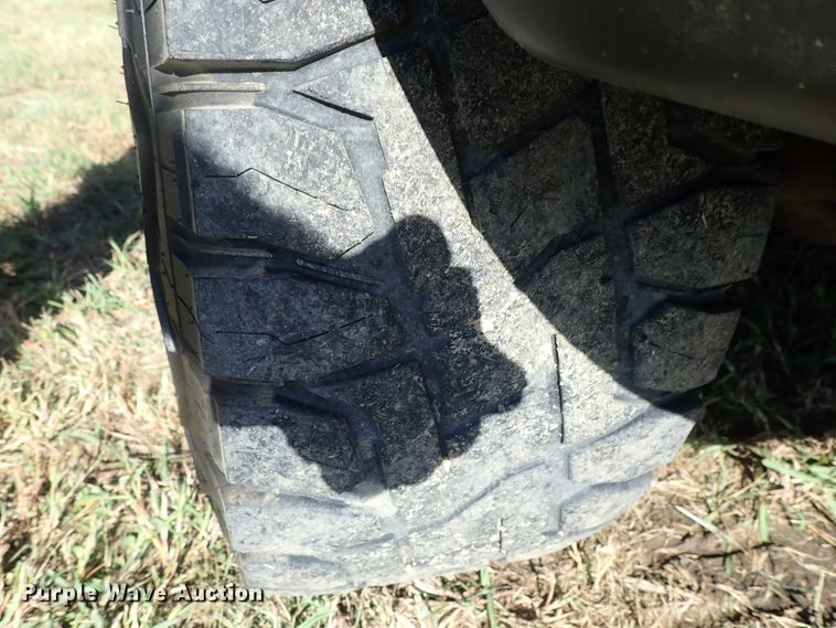 image for item DB7700 2003 Ford F250 Super Duty Crew Cab flatbed pickup truck