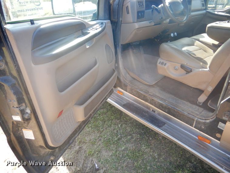 image for item DD4503 1999 Ford F350 Super Duty Crew Cab flatbed pickup truck