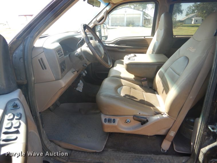 image for item DD4503 1999 Ford F350 Super Duty Crew Cab flatbed pickup truck