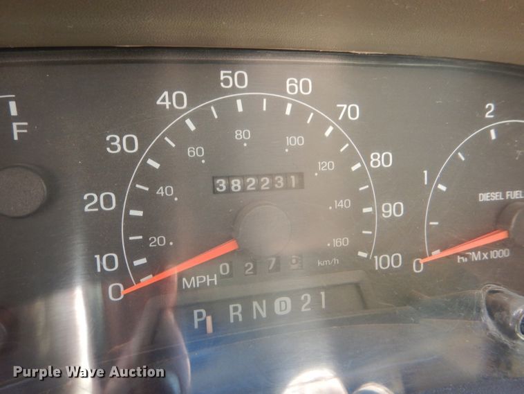 image for item DD4503 1999 Ford F350 Super Duty Crew Cab flatbed pickup truck