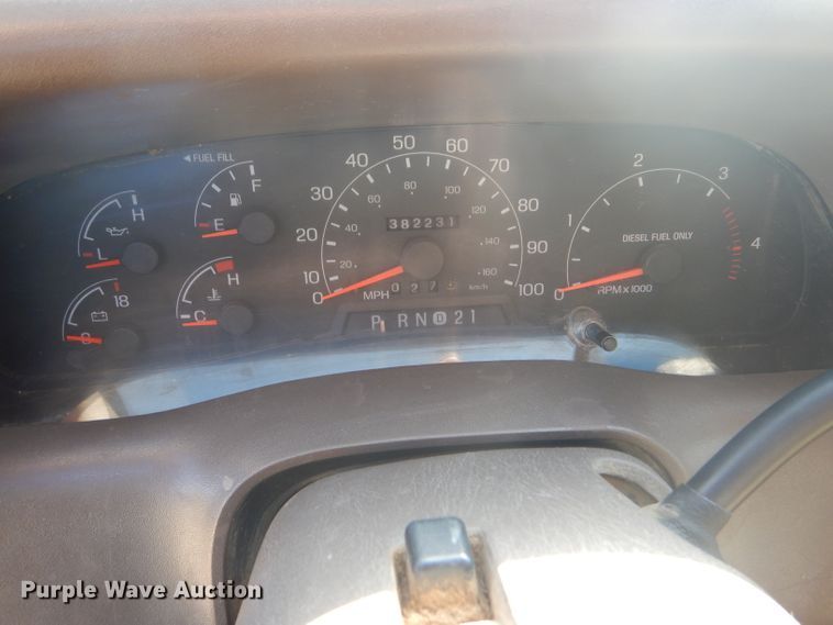 image for item DD4503 1999 Ford F350 Super Duty Crew Cab flatbed pickup truck