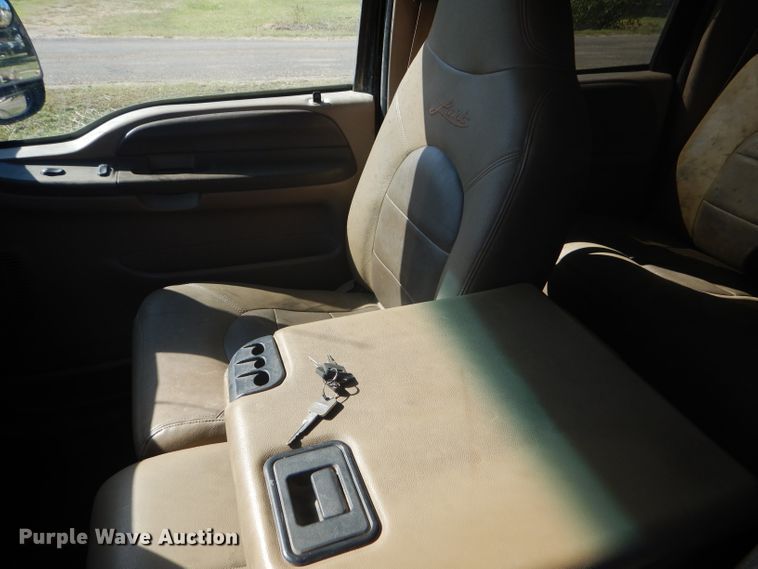 image for item DD4503 1999 Ford F350 Super Duty Crew Cab flatbed pickup truck